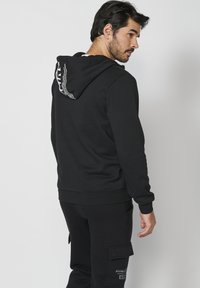 Koroshi Felpa con zip - black