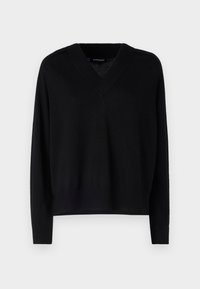 Pull en tricot noir avec un décolleté en V, des épaules tombantes et des bords-côtes aux poignets et à l'ourlet. Texture douce avec une coupe décontractée, idéal pour les superpositions.