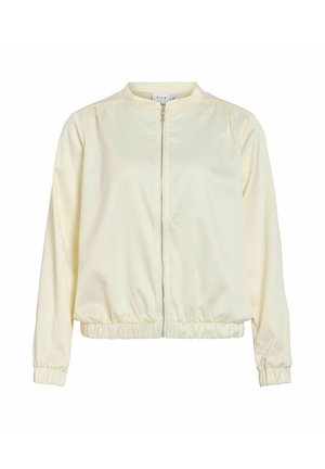 Kremo spalvos lengvas striukė su ilgomis rankovėmis, priekiniais užtrauktuku, elastingomis rankogaliais ir elastingu liemeniu.