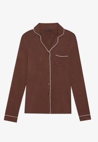 Brun langærmet skjorte med hvid piping, knaplukning og en brystlomme. Fremstillet af et blødt materiale med en afslappet pasform.