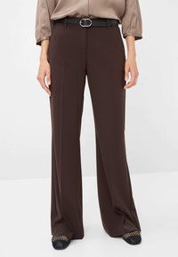 Brown wide-leg trousers with a smooth texture, featuring a black belt with a silver buckle. Designed for a relaxed fit.