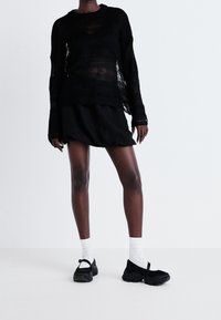 The Ragged Priest Sweter