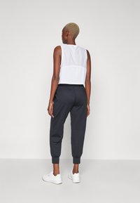 Sweaty Betty GAIA YOGA PANTS - Παντελόνι φόρμας - black
