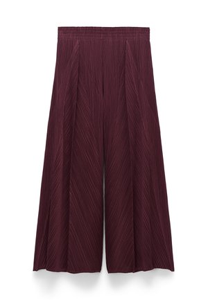 Pantaloni culottes color bordeaux con vita elasticizzata, caratterizzati da pieghe verticali e una vestibilità ampia e morbida. Tessuto liscio con motivo a righe sottili.