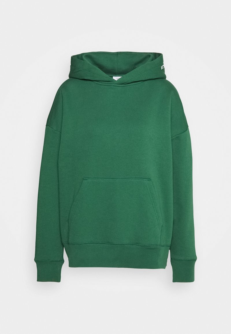 Felpa verde realizzata in morbido materiale, con tasca a marsupio, polsini a costine e vestibilità rilassata. Non presenta motivi né grafiche.