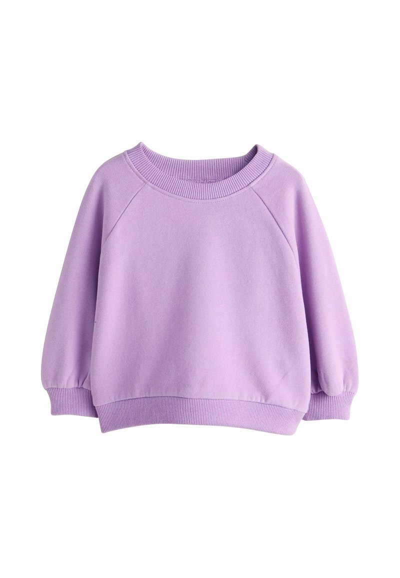 Felpa lavanda con scollo rotondo, maniche raglan, polsini e orlo a coste. Tessuto morbido e vestibilità rilassata.