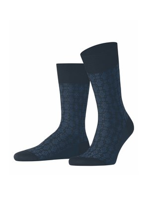 Navy blue socks with a geometric pattern, ribbed cuffs, and reinforced heel and toe for durability. Made from a soft, textured fabric.
