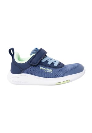 Blue and navy children's sneaker with light green inner lining, Velcro strap, laces, white sole, and "Blanditos by Crio's" branding on side.