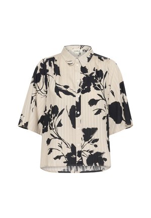 Camicia a maniche corte beige con motivo floreale nero, dotata di chiusura con bottoni e vestibilità leggermente ampia, realizzata in tessuto texturizzato.