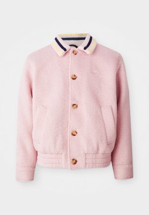 Pink, textured jacket with a ribbed collar featuring yellow, purple, and white stripes. Includes wooden buttons and side pockets.