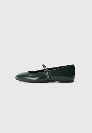 Dark green patent leather flat shoe with a single thin strap and small silver buckle, featuring a rounded toe and low heel.
