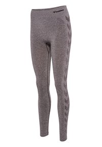Sportowe legginsy w kolorze szary melanż z bocznym wzorem w jodełkę i logo "hummel" blisko pasa.