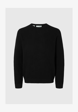 Pull noir en tricot avec un encolure ronde, des manches longues et un ourlet côtelé. La texture est uniforme sur tout le tissu.