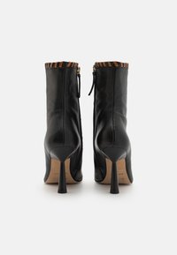 ALOHAS LEO - Kotníkové boty - black