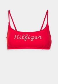 Top bikini rosso con spalline sottili regolabili, decorato con un logo "Hilfiger" incastonato di cristalli sulla parte anteriore. Tessuto morbido ed elastico.