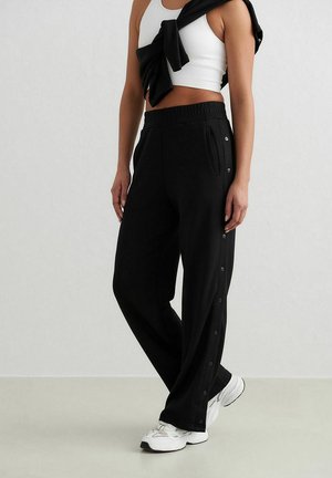 aim’n® COMFY BUTTONED - Trousers - black