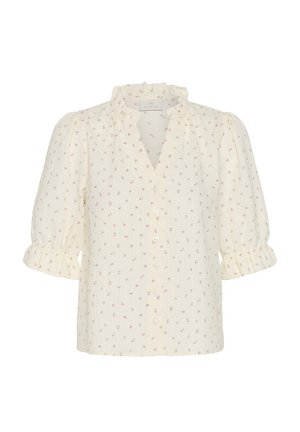Blouse crème à motif floral rouge foncé, col à volants, boutonnée à l'avant, manches bouffantes aux coudes avec poignets à volants.