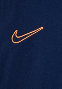 Nike Performance UNISEX - Spordi T-särk - blue void/black/orange pulse