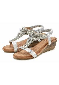 Sandali con zeppa impreziositi in argento, caratterizzati da una soletta testurizzata, una fascia elastica regolabile e un design a T con dettagli decorativi.