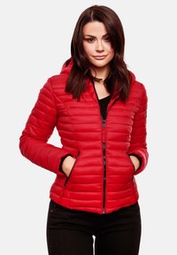 Red puffer jacket with a hood, featuring horizontal quilted pattern, front zip closure, and two side pockets. Fabric is smooth and lightweight.