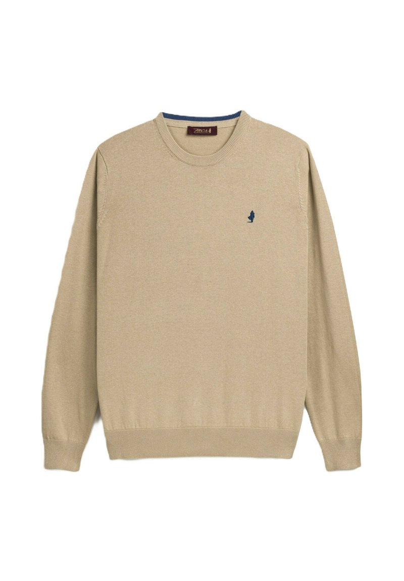 Maglione beige a maglia con maniche lunghe, collo a giro, polsini e bordo a costine. Presenta un piccolo logo blu sul petto. Tessuto morbido.