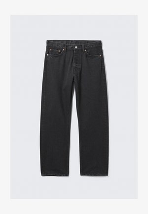 Crne traperice s ravnim krojem, s gumbom za zatvaranje, pet džepova i akcentima od bakrene boje. Glatka tekstura.