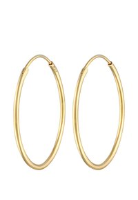 Goldene Creolenohrringe mit einem glatten, runden Design. Sie haben ein dünnes Profil und einen sicheren Verschlussmechanismus. Polierte Oberfläche.