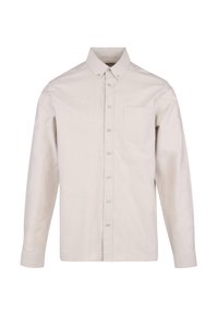 Lys beige langermet skjorte med knapper, krage, enkelt brystlomme og teksturert stoff. Har hel knappestolpe.