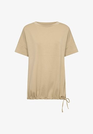 Beige T-Shirt mit kurzen Ärmeln und rundem Ausschnitt, mit gerafftem Gummizug am Saum, der eine seitliche Bindeschleife zur regulierbaren Passform aufweist.