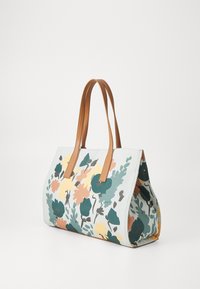 Sac fourre-tout avec un imprimé floral en vert, jaune et orange sur un fond clair, doté de poignées en simili cuir marron et d'une forme structurée.