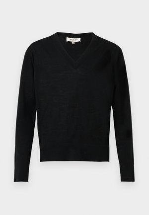 Pull noir à manches longues avec col en V, poignets et bordures côtelés, étiquette indiquant "Paul & Joe", présenté sur un fond clair uni.