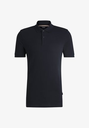 Marineblaues Polohemd aus strukturiertem Stoff. Mit einer Knopfleiste mit zwei Knöpfen, kurzen Ärmel und gesticktem Logo auf der linken Brust.