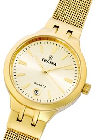 Reloj de cuarzo dorado con banda de malla metálica. Caja redonda, esfera dorada, marcadores de hora y una pantalla de fecha a las 6. Diseño minimalista.