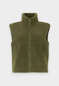 Olivno zeleni flis brezrokavnik z visokim ovratnikom, zadrgo in dvema sprednjima žepoma. Teksturna tkanina z mehkim, prijetnim videzom.