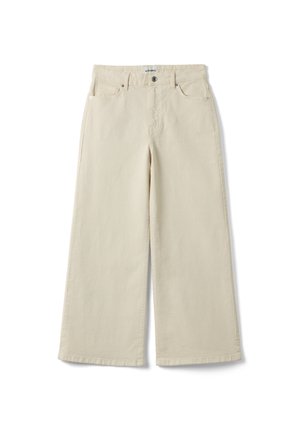 Pantalones beige de pierna ancha con botón y cremallera delanteros, trabillas para cinturón y bolsillos delanteros, confeccionados en tejido vaquero.