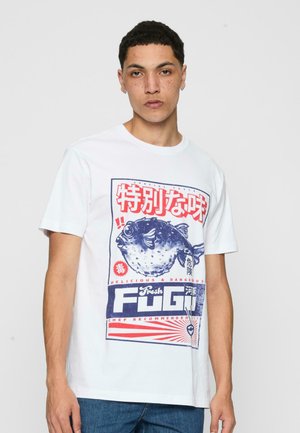 White short-sleeve t-shirt featuring a graphic print of a pufferfish with red and blue text. Cotton material with a relaxed fit.