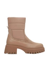 Tan enkellaarsjes met een stevige platform en gestructureerde accenten. Gemaakt van soepel leer en suede, met een gevoerde kraag en een trekband.