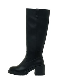 Bottes noires montantes en cuir lisse, dotées d'un talon large, d'un bout rond et de subtils détails de surpiqûre sur les côtés.
