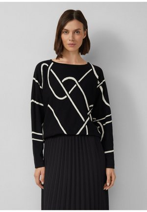 - Sweter