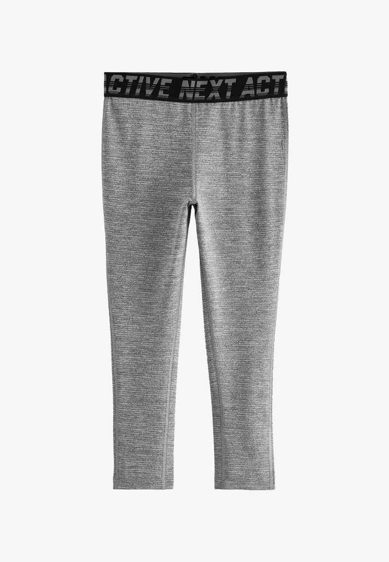 Leggings actifs gris avec un tissu texturé, une coupe ajustée et une ceinture élastique noire affichant "ACTIVE NEXT" en lettres grasses.