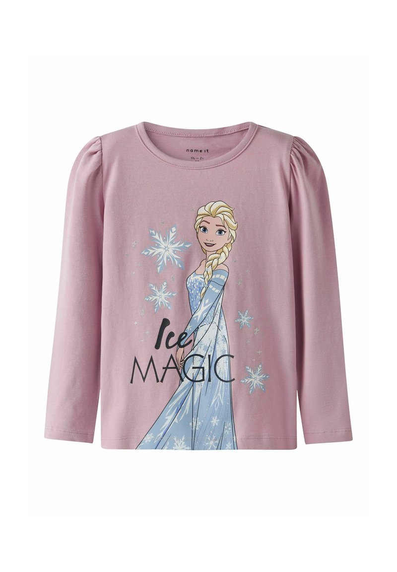 Chemise à manches longues rose clair avec un graphique représentant un personnage aux cheveux blonds portant une robe bleue, ornée de flocons de neige et du texte "Magie de Glace".