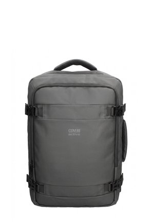Sac à dos rectangulaire gris avec poignée rembourrée, sangles latérales réglables, poche avant zippée et logo "Coveri active" sur le devant.
