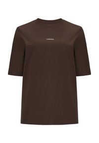 Brązowy t-shirt z krótkim rękawem wykonany z miękkiego materiału, z okrągłym dekoltem i białym napisem "LAMANIA" umieszczonym na wysokości klatki piersiowej.