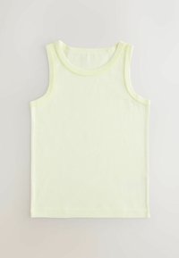 Vaaleankeltainen hihaton toppi, jossa on hienovarainen aaltoileva reuna pääntien ja kainaloiden ympärillä, aseteltuna tasaisesti vaalealle taustalle.