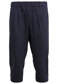 Pantalons cropped bleu marine foncé avec une taille élastique, présentant des plis à l'avant et une texture de tissu lisse pour le confort et la flexibilité.