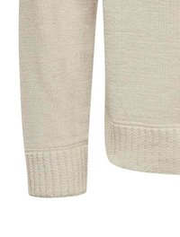 Suéter beige de punto con tejido texturizado, puños y dobladillo acanalados. Presenta un corte holgado y un diseño sencillo.