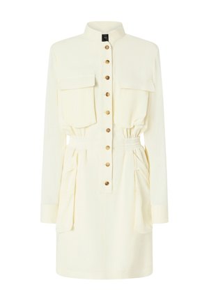 Vestito color crema con maniche lunghe, apertura frontale con bottoni, due tasche sul petto, vita elasticizzata e fianchi arricciati. Realizzato in tessuto leggero.