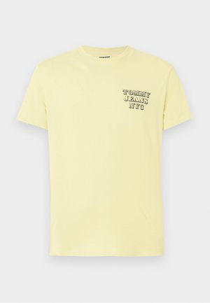 Ljusgul bomullströja med korta ärmar och rund halsringning. Har en tryckt logotypdesign på vänster bröst.