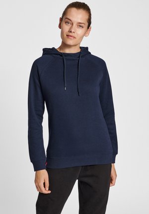 Sweatshirt bleu marine avec une capuche, des accents de cordon, des manches raglan et une texture neutre. Dispose d'un ourlet et de poignets côtelés.