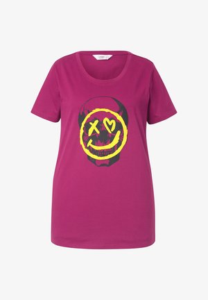 Paarse katoenen t-shirt met een ronde hals, voorzien van een zwart schedelgraphic omrand met geel, met een glimlachend gezicht en hartogen.